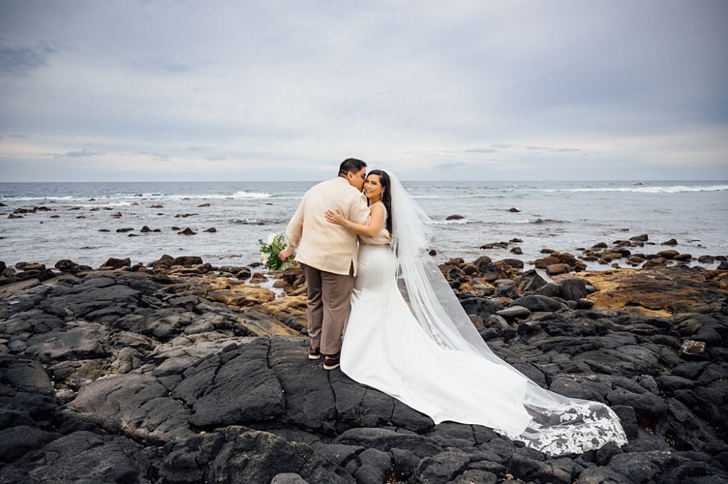sweet moments of the newlyweds on Big Island lava rocks