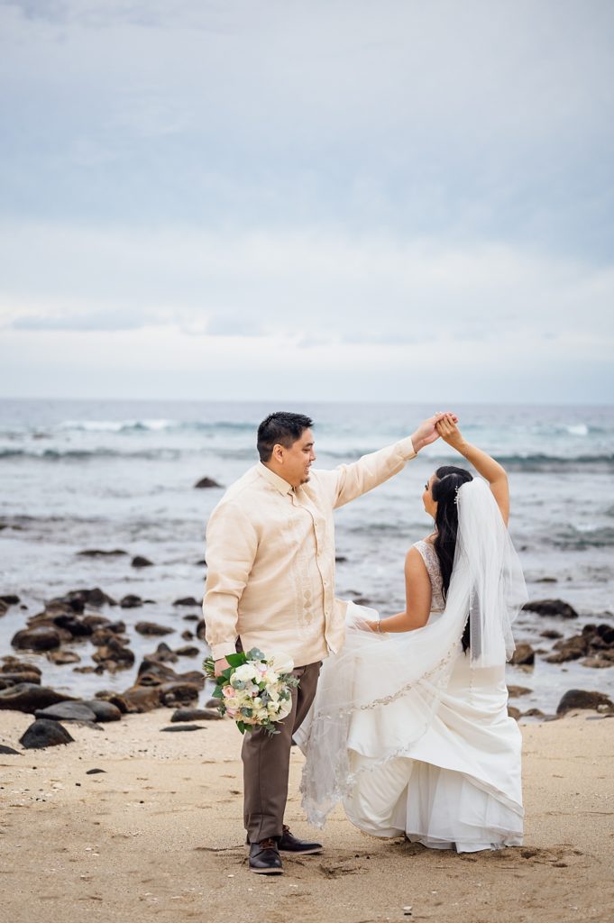 bride twirling on the Big Island beach