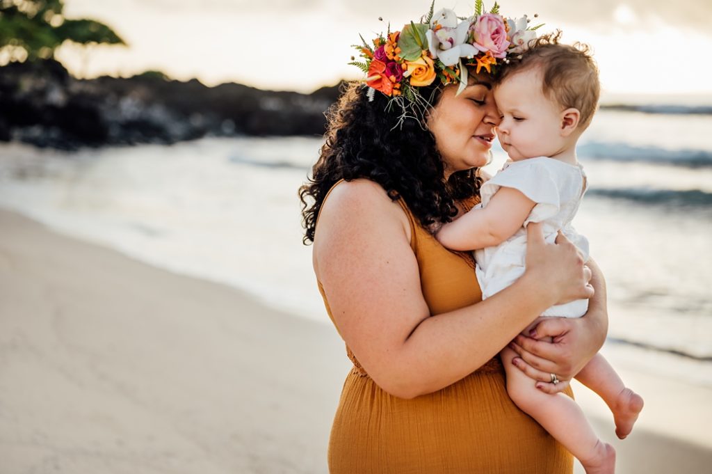 sweet photo of mom and baby at Hawaii beach