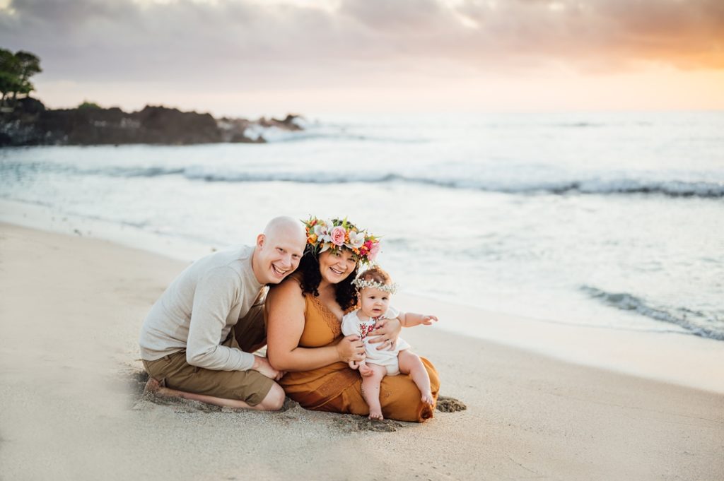 happy family photo in Hawaii sand