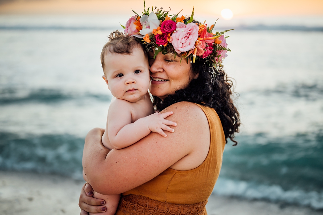 sweet photo of mom and her baby at Hawaii beach