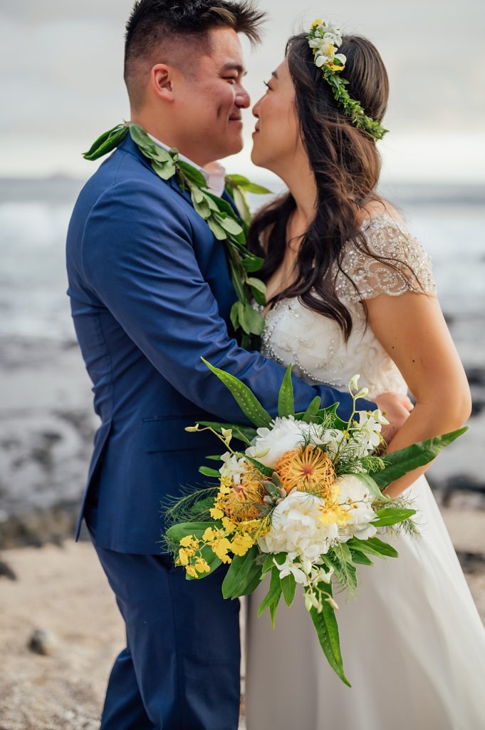 sweet moments of bride and groom during their Hawaii wedding