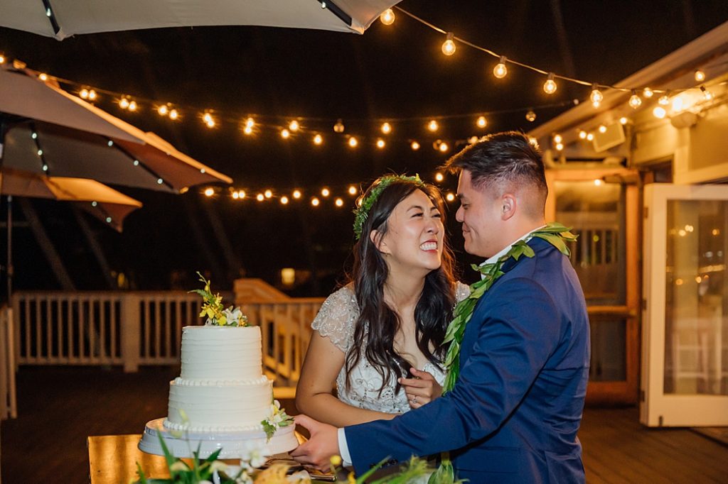 happy moments of the newlyweds during their Hawaii wedding reception