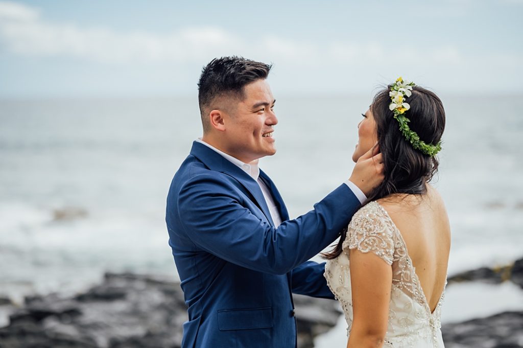 happy couple during their first look at the Hawaii beach