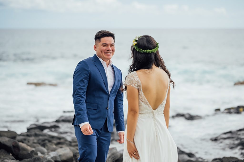 groom happy to see the bride at the Hawaii beach