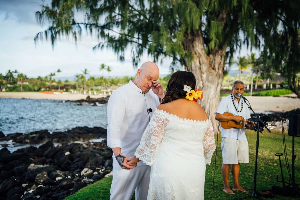 emotional groom during their Hawaii wedding ceremony 