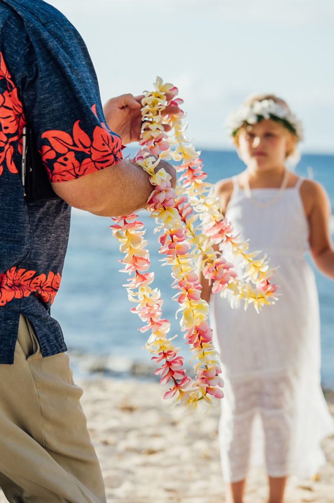 bright colored leis for an elopement