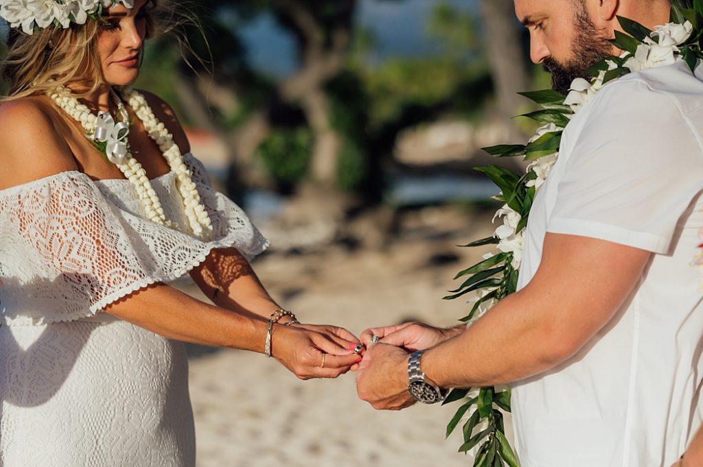 exchange of rings between bride and groom during their elopement