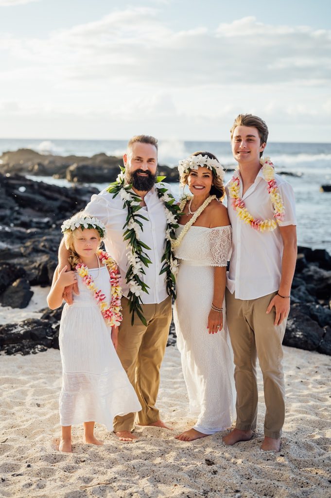 beautiful family of bride and groom at the Hawaii beach