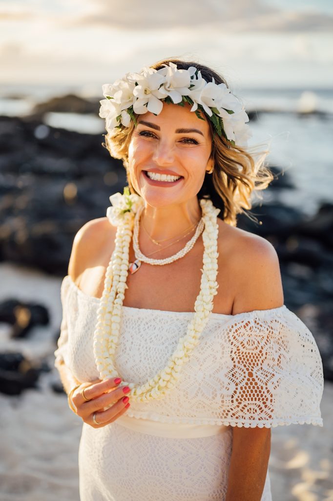 a happy Hawaii bride at the beach