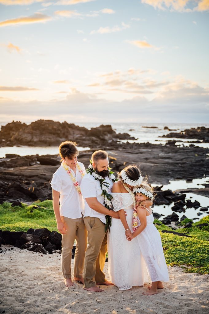 precious moments the couple's family during their Hawaii elopement