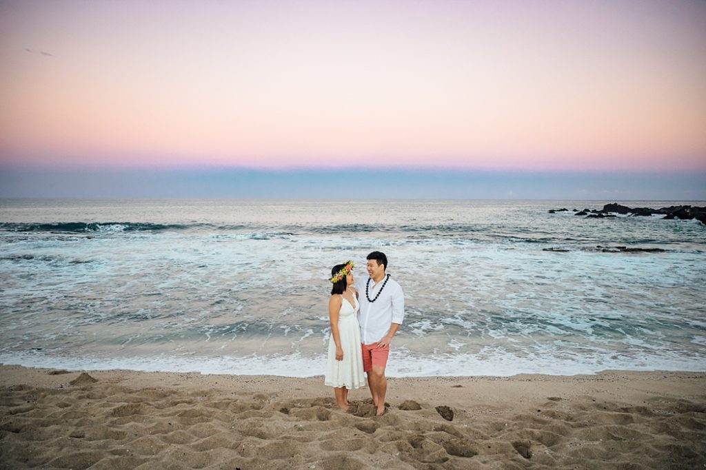 engagement photo of the couple at the beach
