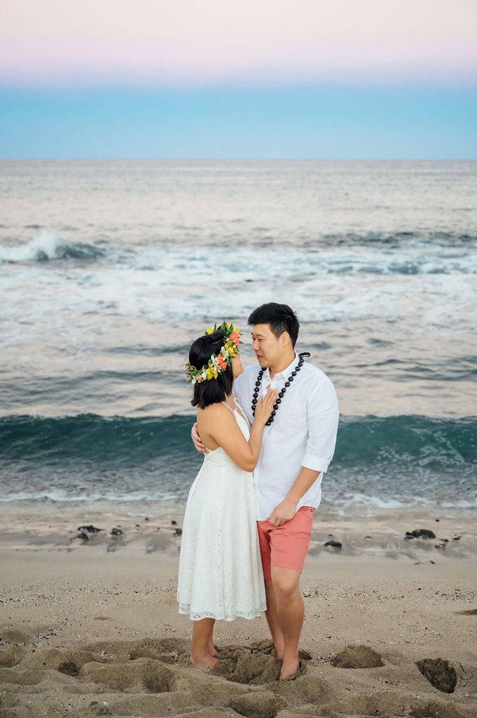couple looking adoringly at each other during their Hawaii engagement