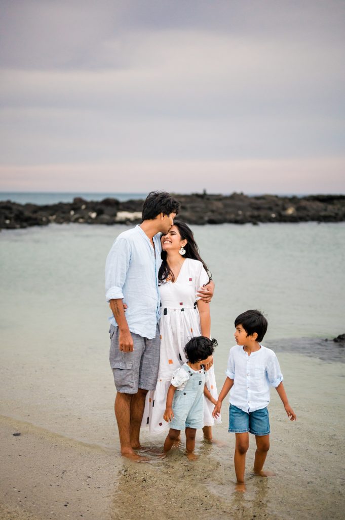 sweet moments of the family at a beach in Hawaii