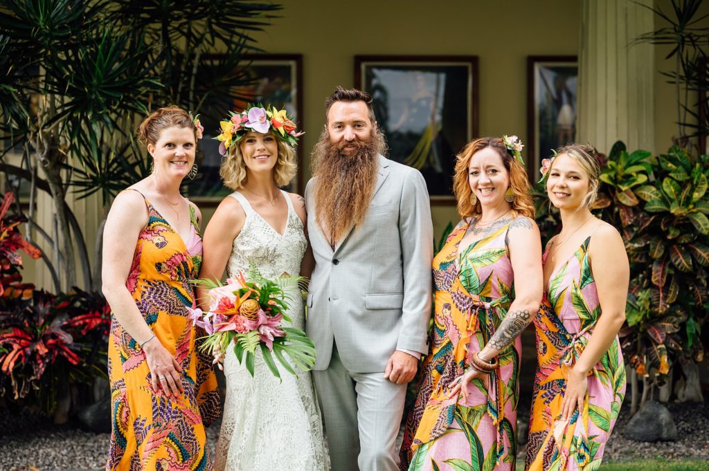 bride and groom with the bridesmaids at Royal Kona