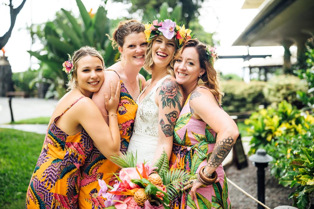 happy bride with her bridesmaids during her Kona wedding