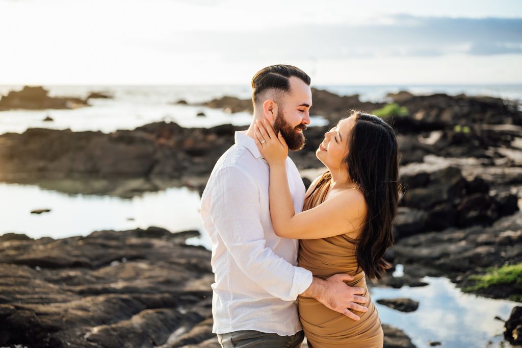 engagement photo of a couple looking adoringly at each other