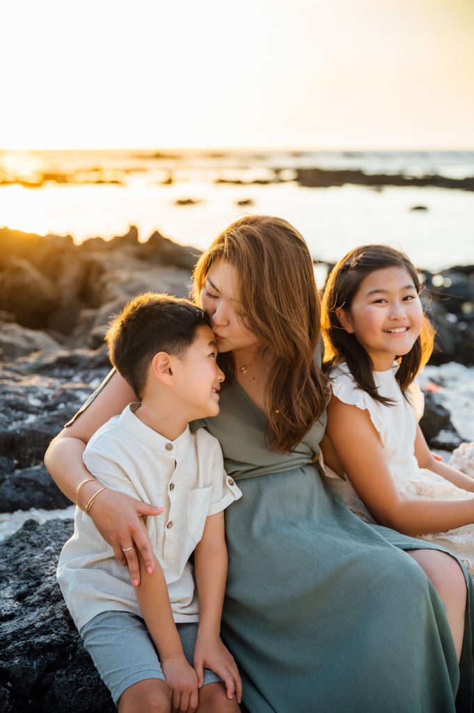 treasured moments of mom and her children during Hawaii sunset