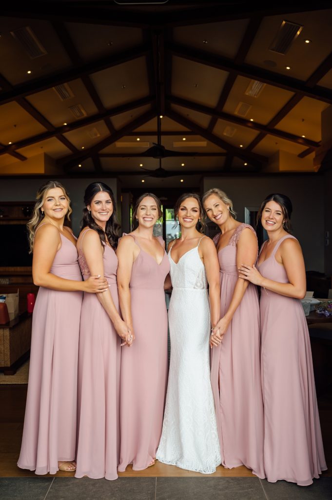 lovely bride with her bridesmaids by Hawaii photographer