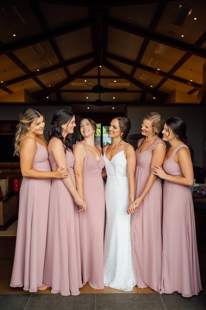 lovely bride with her bridesmaids by Hawaii photographer