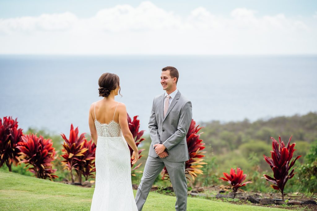 groom's first look with the bride during their Hawaii wedding