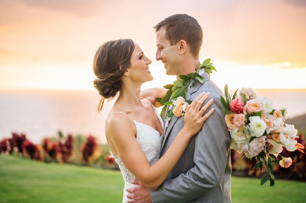 newlyweds looking adoringly at each during their Hawaii wedding