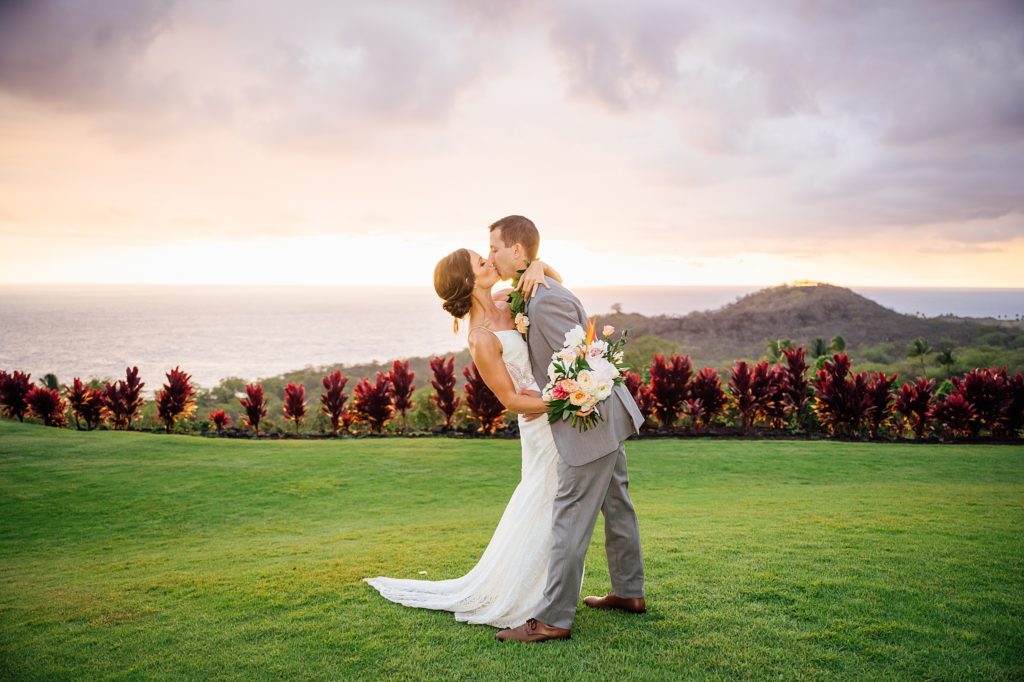 bride and groom kissing during their Hawaii wedding
