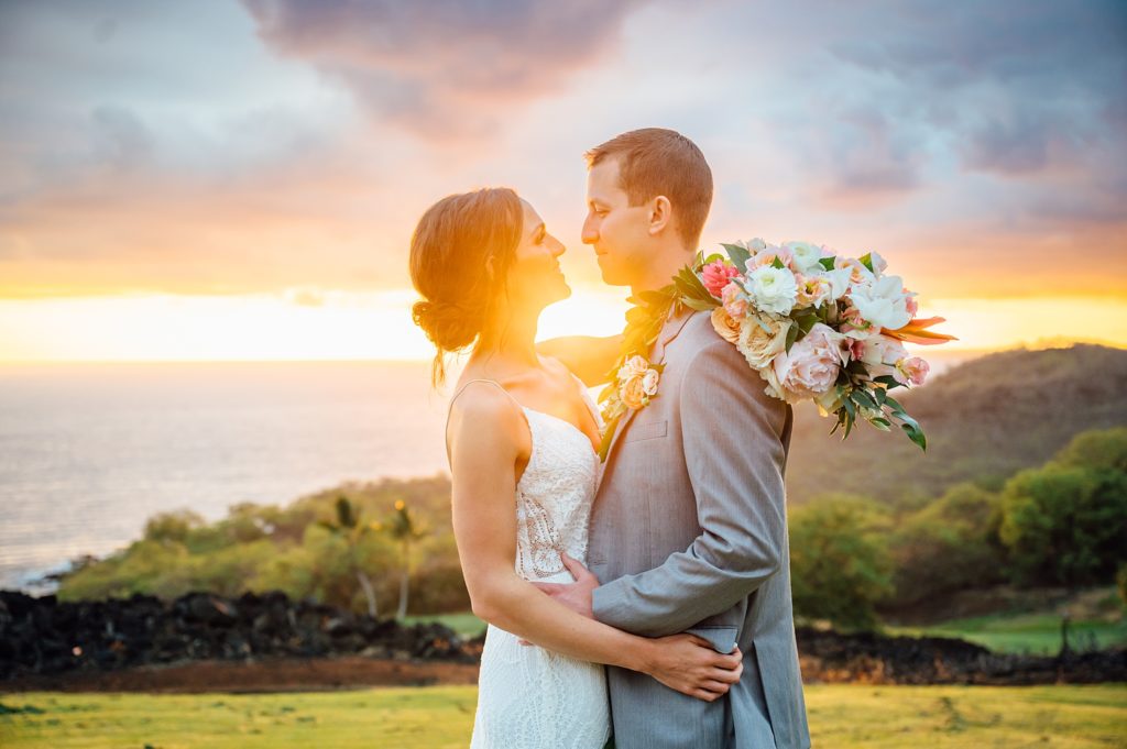 newlyweds looking adoringly at each other during their Hawaii wedding