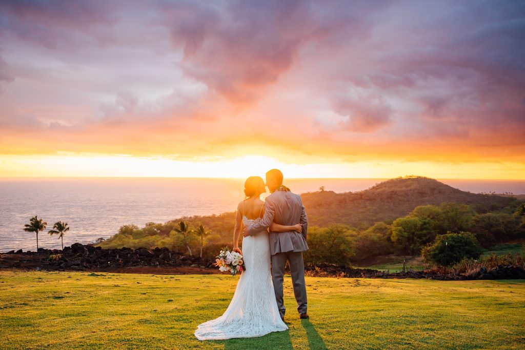 stunning sunset photo with bride and groom in Hawaii