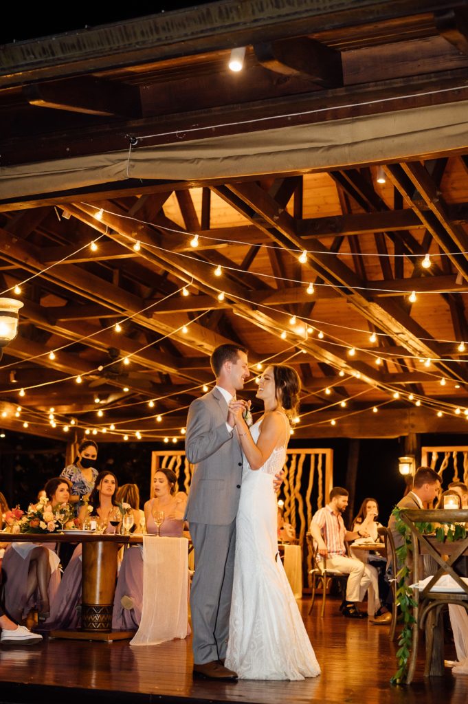 bride and groom's first dance during their wedding reception