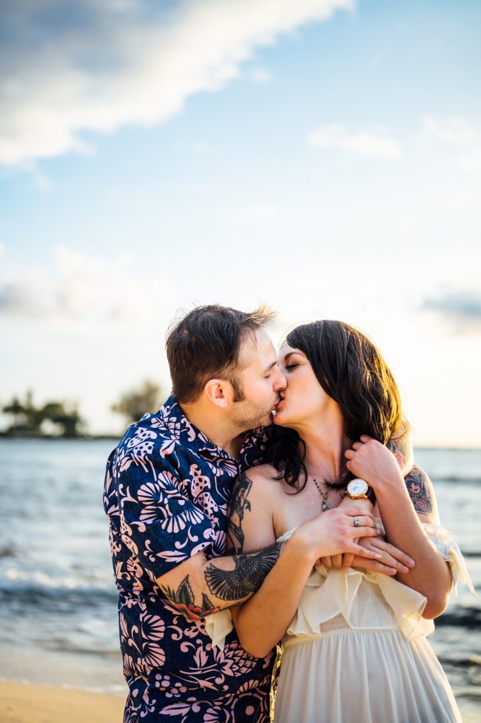 couple kissing during their engagement session in Hawaii