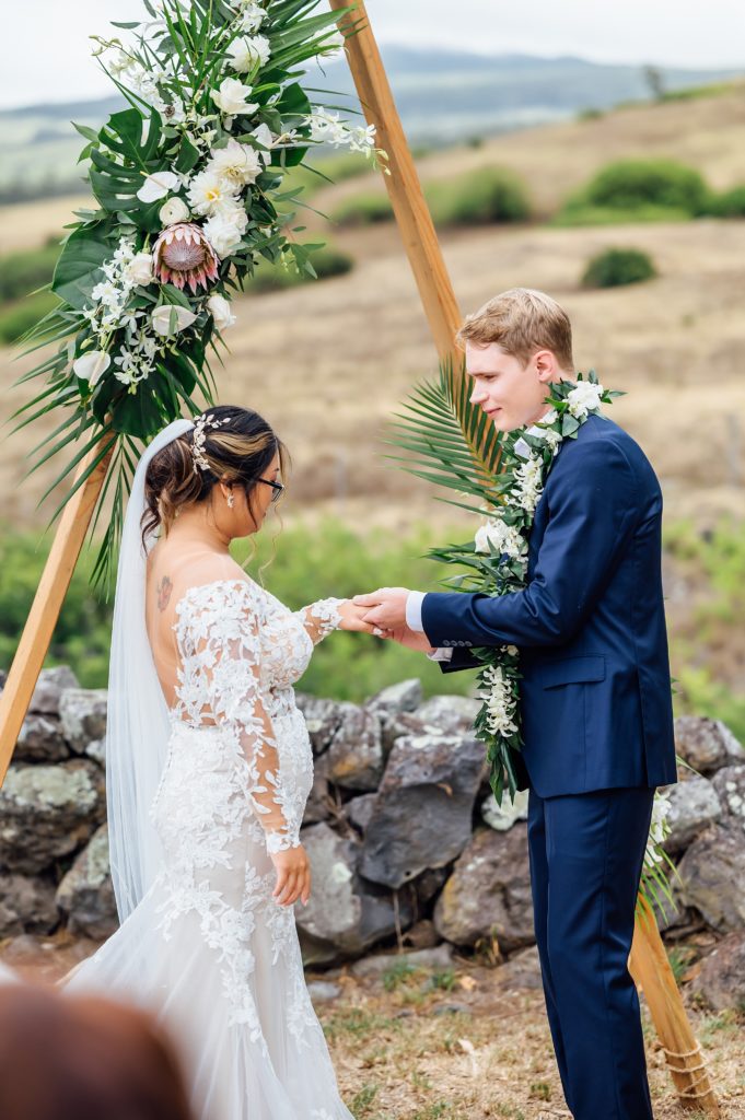 bride and groom exchanging their wedding rings during Hawaii ceremony