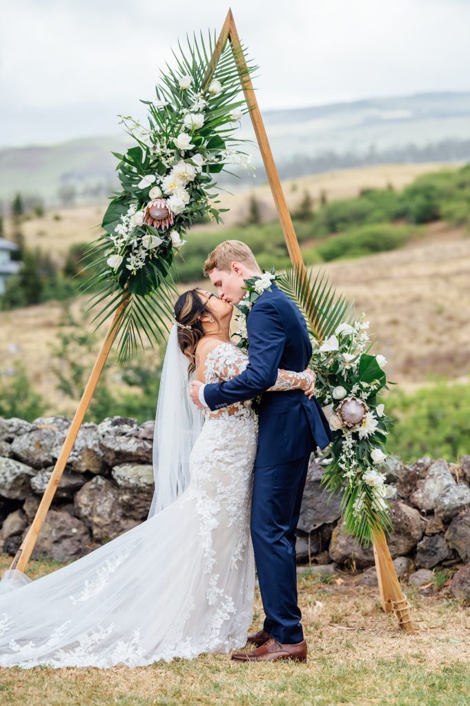 bride and groom kissing after their Big Island wedding 