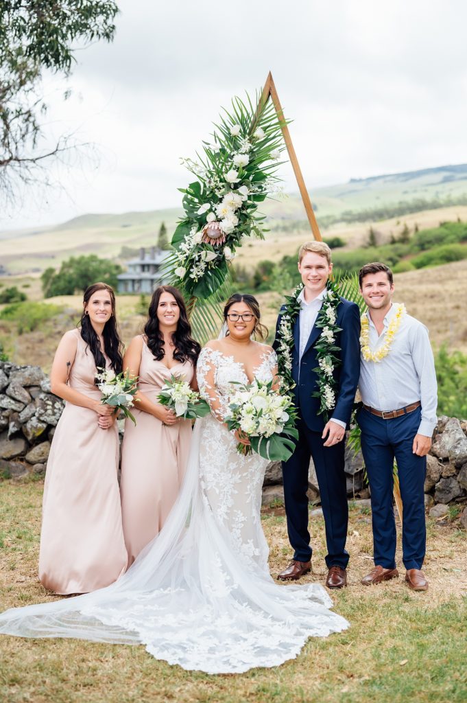 bride and groom with their friends during their Big Island wedding