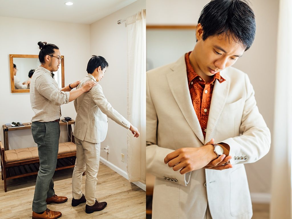groom getting ready with his groomsman's help