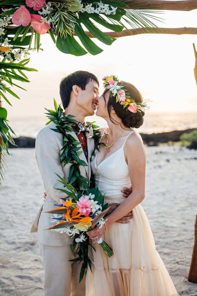 bride and groom about to kiss during their Kona wedding