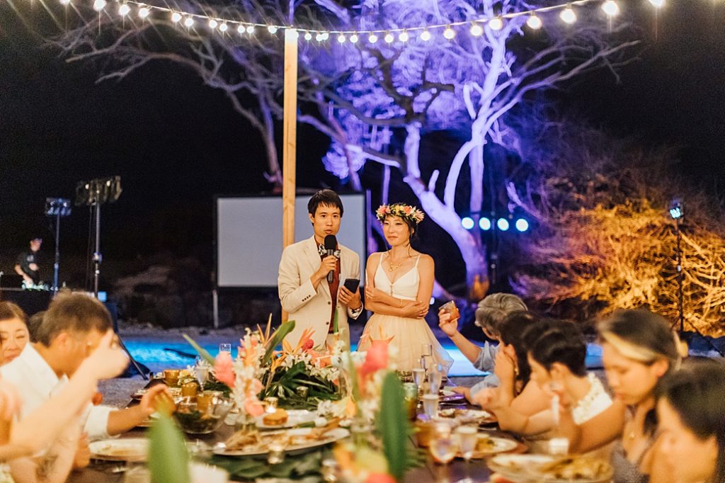 newlyweds giving their speech during their Kona wedding reception