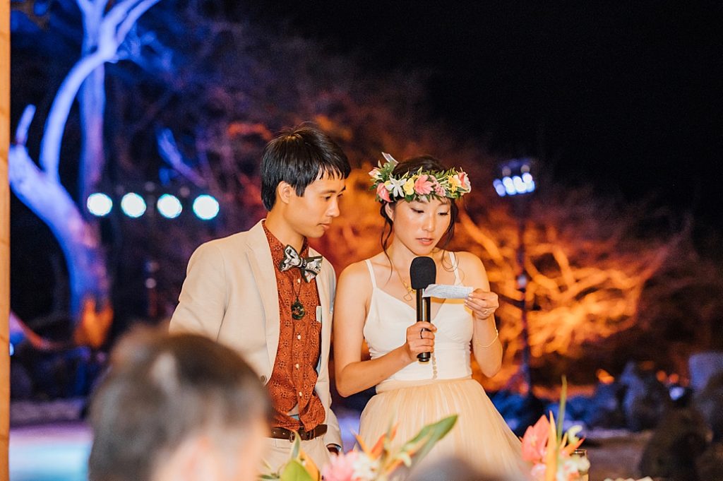 newlyweds giving their speech during their Kona wedding reception